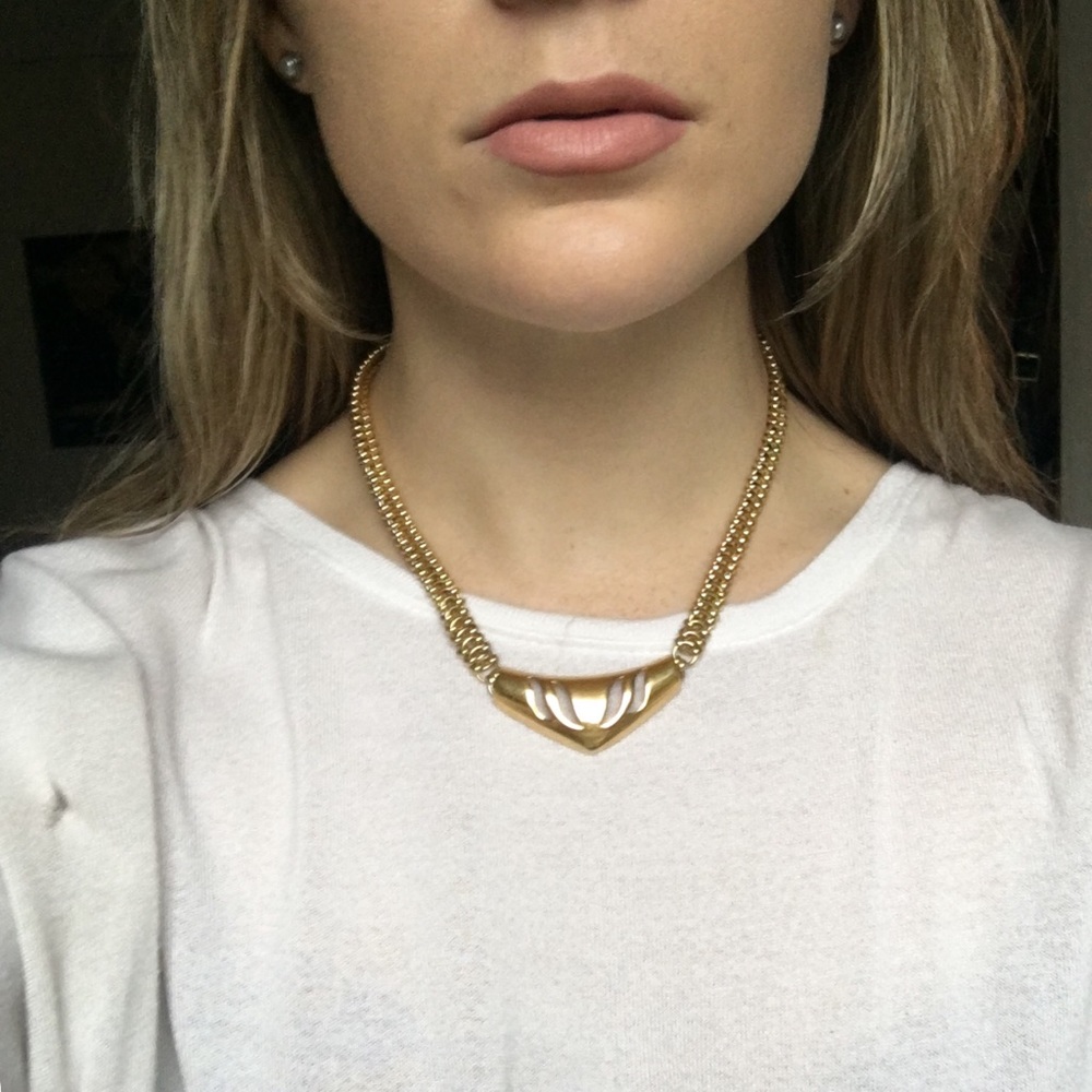 gold necklace with detail